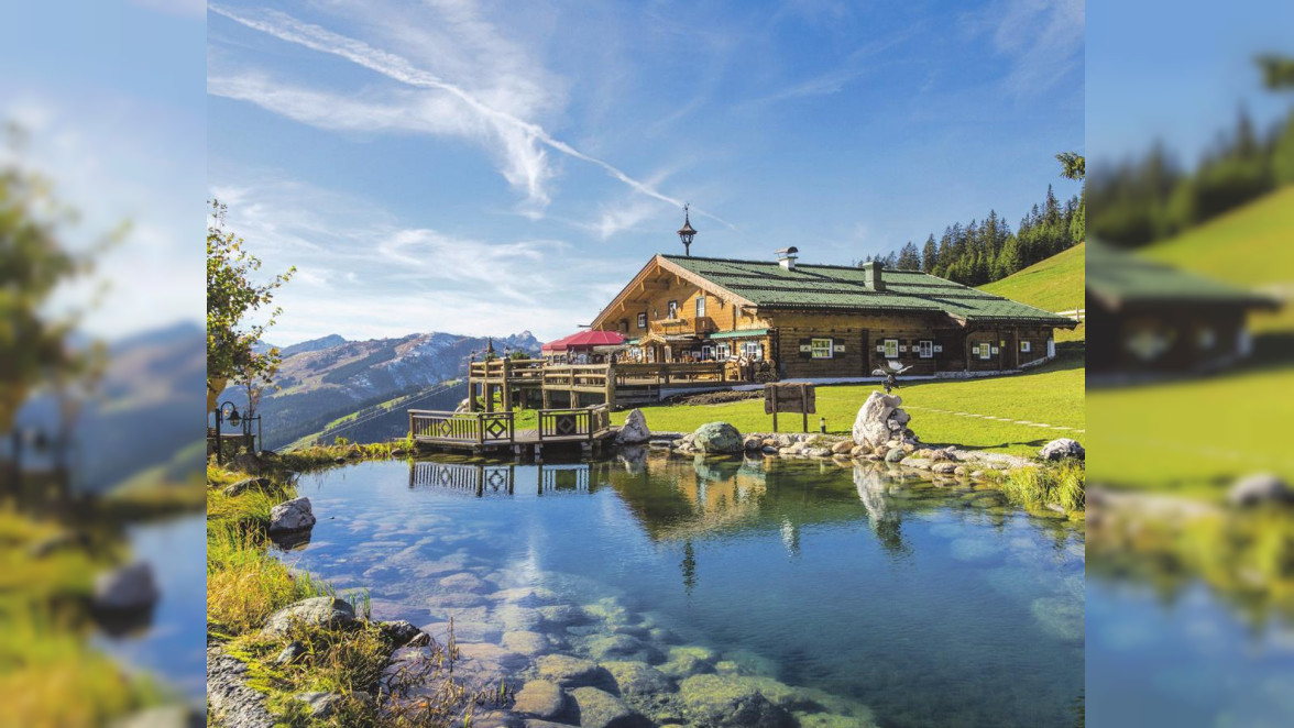Berghütte mit Schwimmteich. Foto: Shutterstock | mRGB