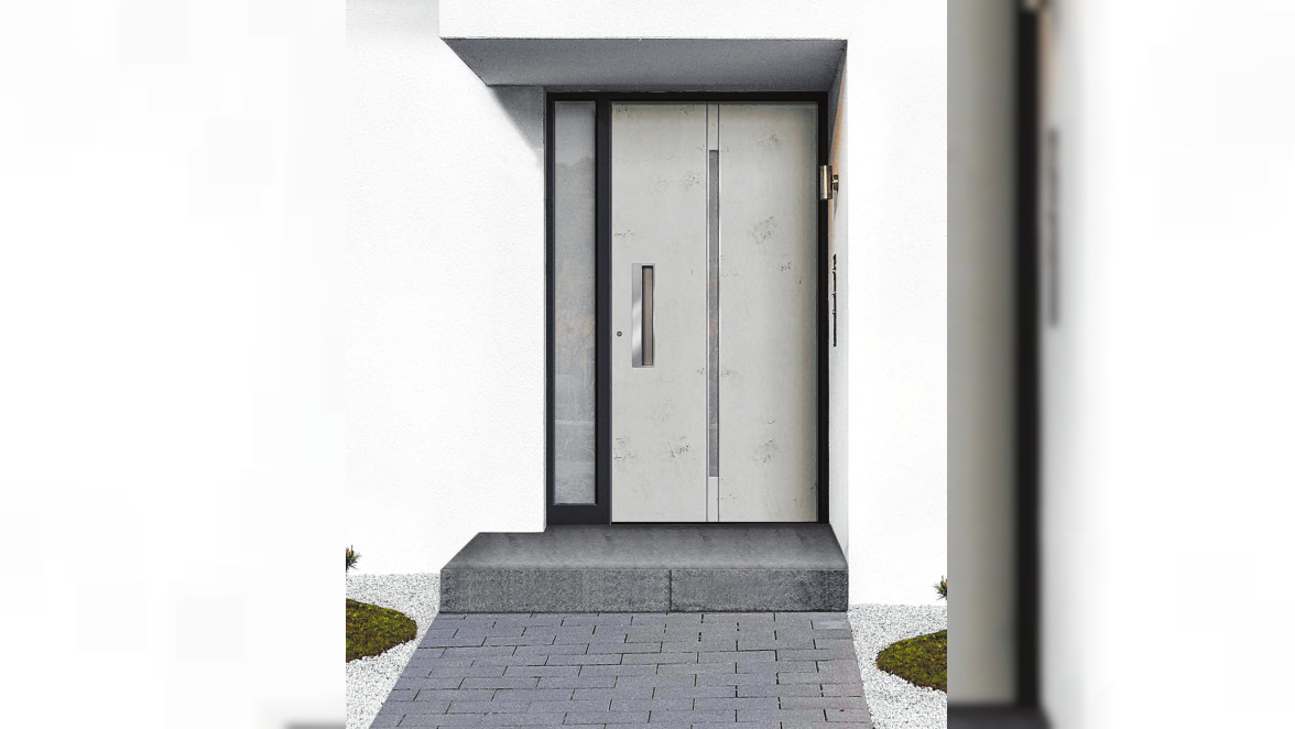 Schlichte, geradlinige Haustüren mit Art-Beton sind derzeit angesagt. picture alliance/dpa/Rodenberg Türsysteme AG
