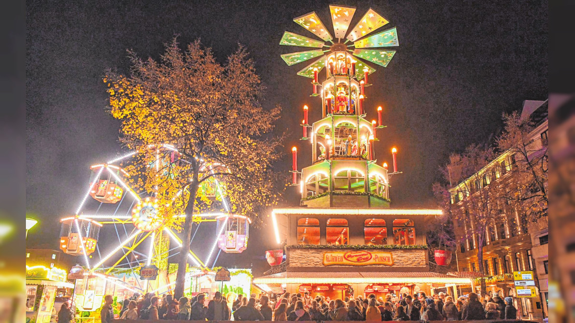 Stimmungsvoll: Der Mannheimer Weihnachtsmarkt rund um den Wasserturm zieht in diesem Jahr wieder zahlreiche Besucher an. BILD: MICHAEL RUFFLER